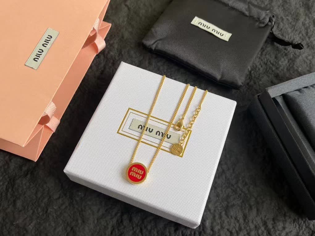 Miu Miu necklace with red circular pendant